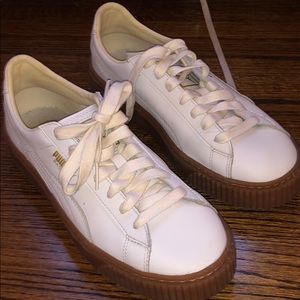 White and Brown Platform Pumas